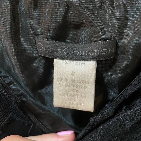 Guess black star and sequin asymmetrical little black dress.  Size 6. - Picture 3 of 3